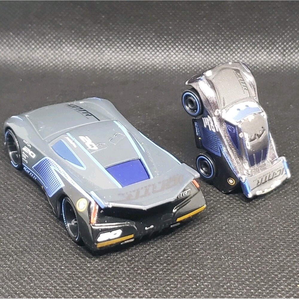 Disney /Pixar /Mattel /Die-cast /Cars Jackson Storm & Mini Racer Movie Car......